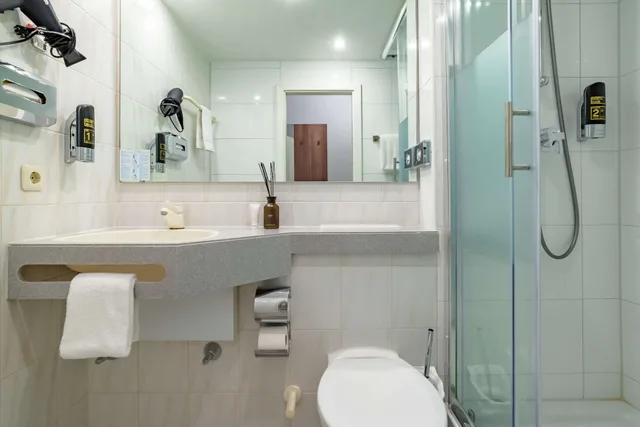 غرفة قياسية مفردة بسرير فردي، Astor Hotel 4/5