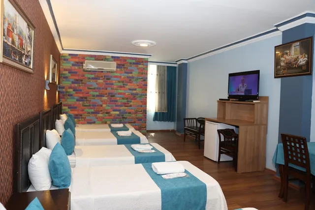 غرفة قياسية ثلاثية بسرير مزدوج وسرير فردي، Adana Saraya Hotel 7/9
