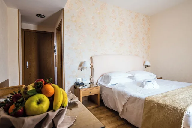 غرفة عائلية بسرير كوين وسرير فردي، Hotel Touring Carpi 3/4