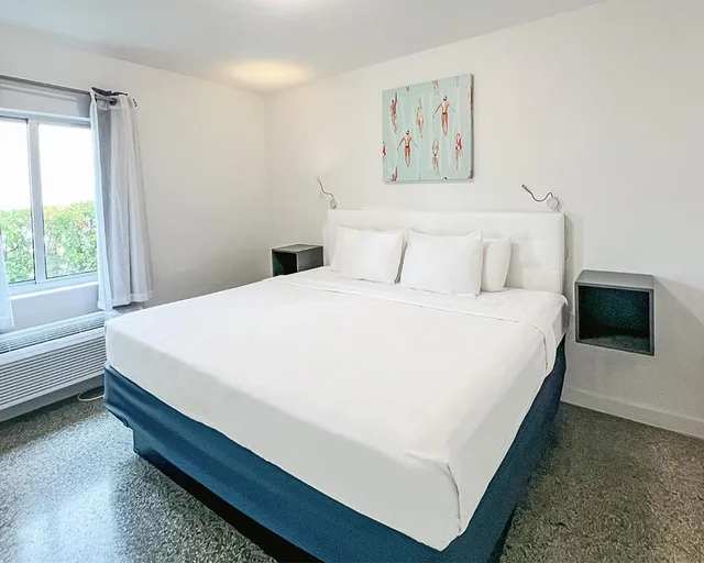 جناح عائلي بسرير كينج وسريرين كوين، Tranquilo A North Beach Village Resort Hotel 1/5