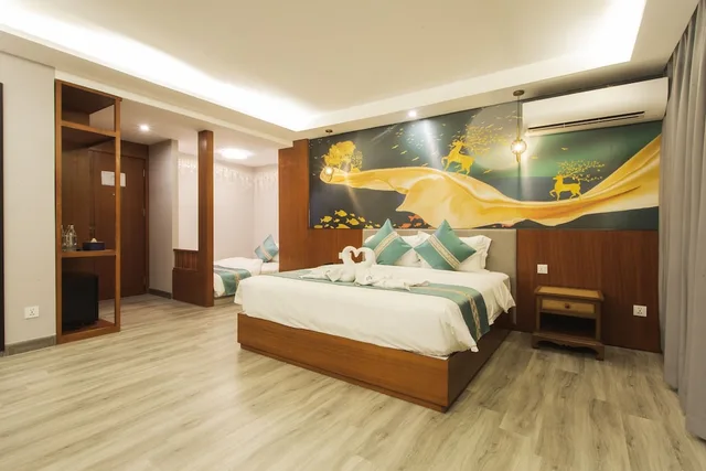 غرفة عائلية بسرير كينج وسرير كوين، Thapae Twins Hotel 3/7