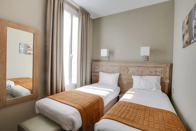 غرفة بسرير مزدوج أو سريرين منفصلين، Hotel Du Printemps 2/4