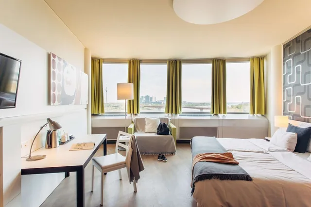 غرفة قياسية بسريرين منفصلين بإطلالة على النهر، harrys home Wien Millennium Tower 5/10