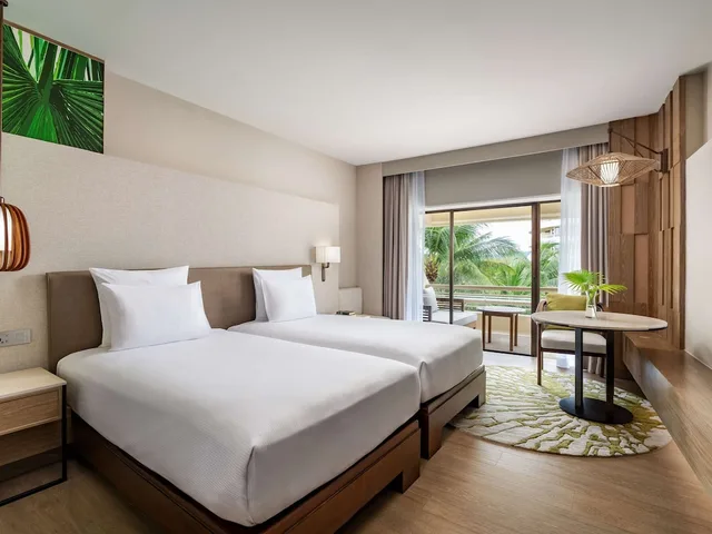 غرفة ديلوكس بسرير مزدوج بإطلالة على الحديقة، Pullman Phuket Karon Beach Resort 5/10