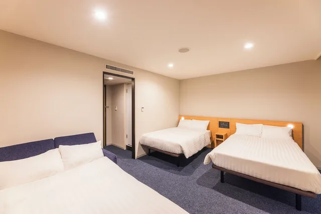 غرفة ثلاثية بسريرين منفصلين مع أريكة، Sotetsu Fresa Inn Nagano-Ueda (ex. Hotel Sunroute Ueda) 1/2