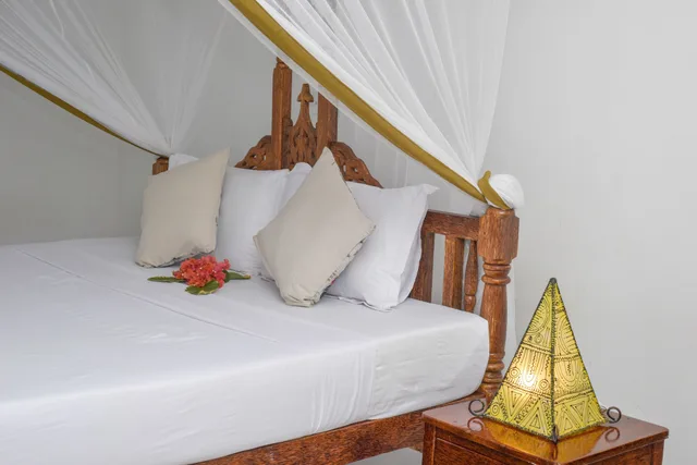 غرفة ديلوكس بسرير مزدوج وسرير فردي بإطلالة على البحر، Pearl Beach Resort by Sansi 1/5