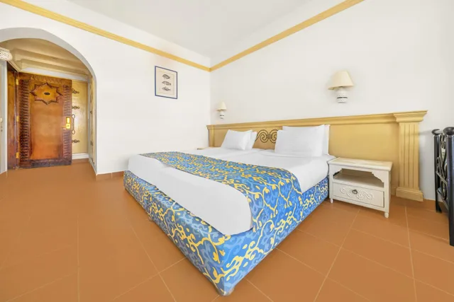 غرفة بسرير مزدوج أو سريرين منفصلين بإطلالة على البحيرة، TOP Domina Coral Bay Resort 1/2