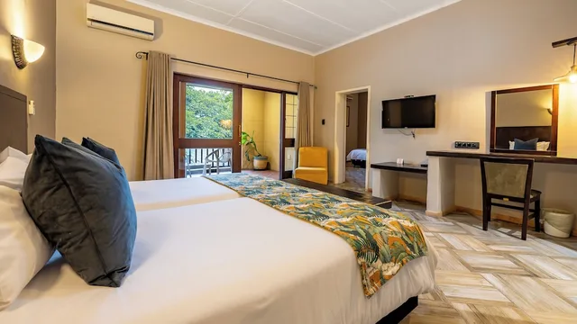 غرفة عائلية بأربعة أسرّة، Hotel Numbi and Garden Suites 3/4