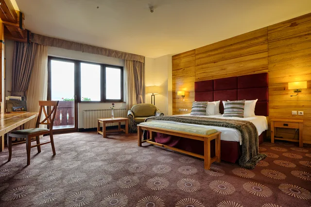 جناح جونيور بإطلالة على الجبل، Kempinski Hotel Grand Arena 1/9