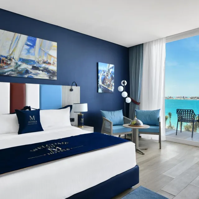 غرفة ديلوكس بسرير مزدوج أو سريرين منفصلين بإطلالة على البحر، M Hotels at Porto Marina 1/1
