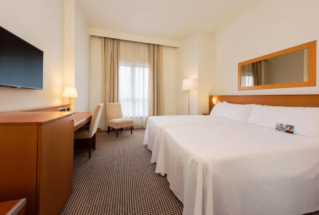 غرفة قياسية بسرير مزدوج أو سريرين منفصلين، Hotel Zentral Leon 2/3