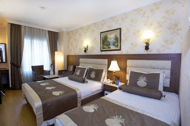 غرفة عائلية بسرير مزدوج وسريرين منفصلين، Grand Hilarium Hotel 1/10