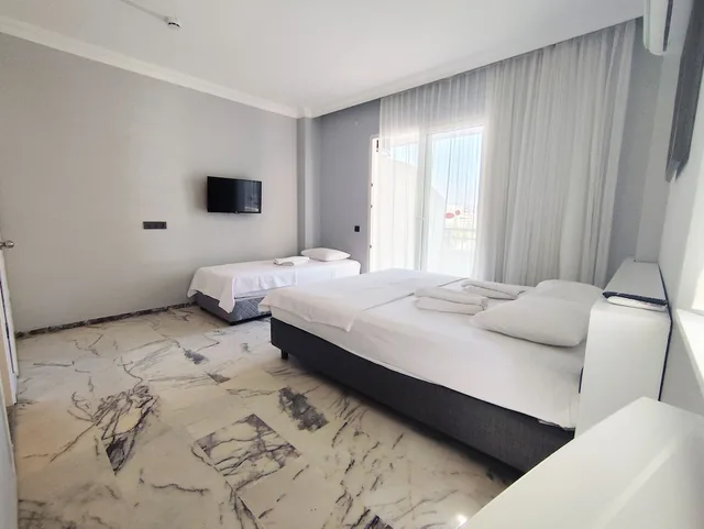 غرفة قياسية بسرير مزدوج بإطلالة جزئية على البحر، Sav-ir Suit Otel 6/9
