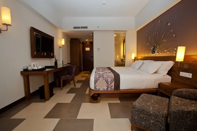 غرفة ديلوكس بسريرين منفصلين بإطلالة على المسبح، Sun Island Hotel and Spa Kuta 2/5