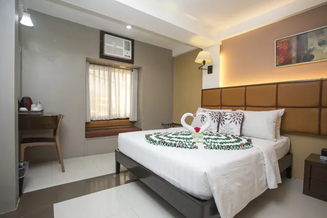 غرفة بريميير بسريرين كوين، Red Coco Inn de Boracay 4/9