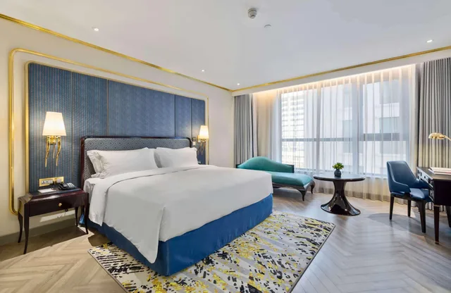 غرفة ديلوكس بسرير كينج، Dolce by Wyndham Hanoi Golden Lake 1/2