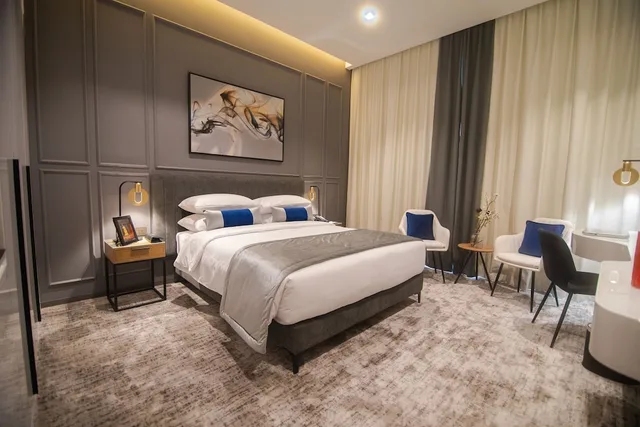 غرفة متصلة تنفيذية بسرير كوين وسريرين منفصلين، Rose Executive Hotel DWTC 6/7