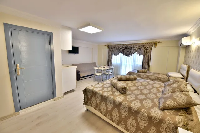 غرفة ديلوكس ثلاثية بإطلالة على البحر، Oban Suites 9/10
