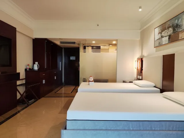 غرفة بسريرين منفصلين بإطلالة على البحر، Wyndham Garden Wenchang Nanguo 2/6