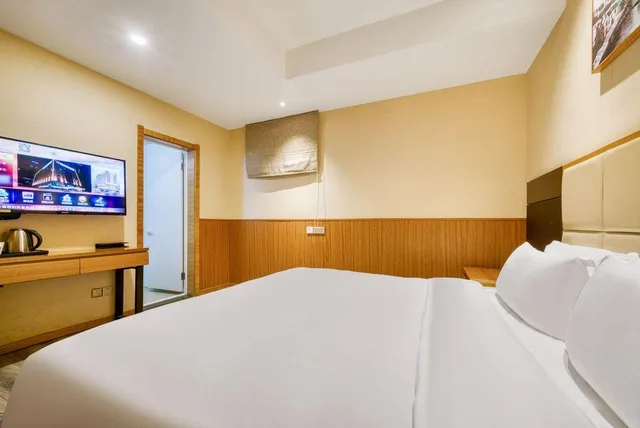 غرفة اقتصادية بسرير كوين، Qingdao Airport Fuhua Hotel 1/2