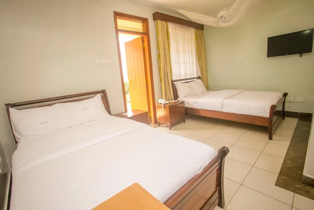 غرفة بسريرين منفصلين بشرفة، Desmond Tutu Guest House 7/8