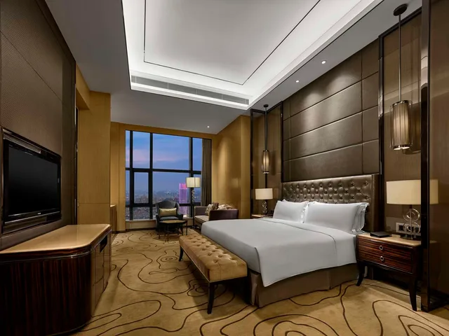 جناح ديلوكس بسرير كينج مع دخول الصالة، Hilton Zhongshan Downtown 1/2