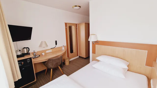 غرفة مفردة بسرير فردي، Hotel Garni Metzingen 3/4