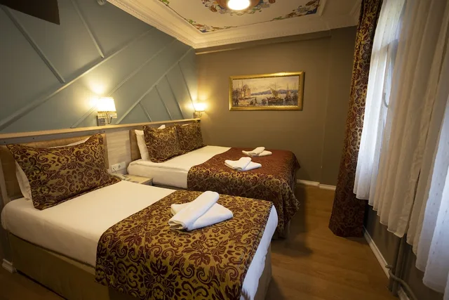 غرفة ثلاثية بثلاثة أسرّة، Tashkonak Hotel 4/8
