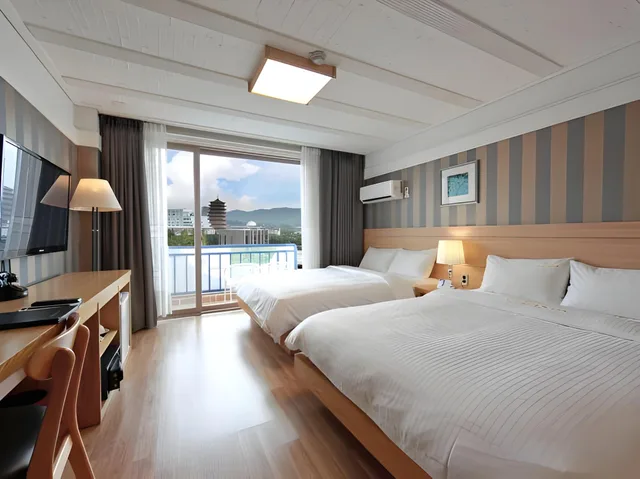 غرفة قياسية بسرير كوين وسرير فردي، Benikea Swiss Rosen Hotel 1/2
