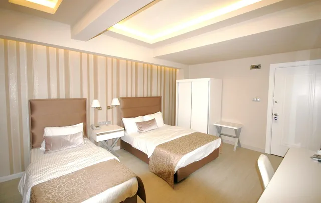 غرفة بسرير مزدوج أو سريرين منفصلين، Kent Otel 4/6