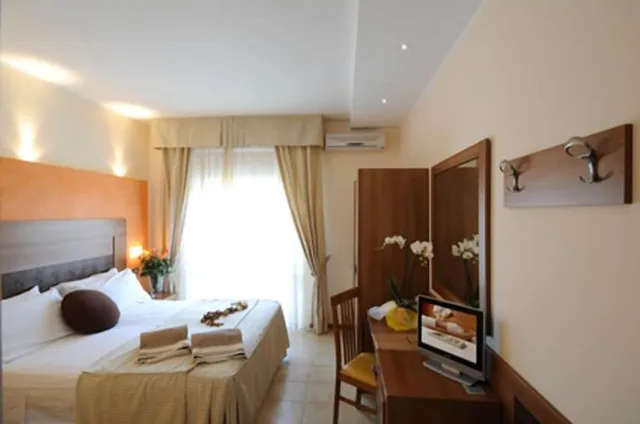 غرفة قياسية ثلاثية بسرير مزدوج وسرير فردي، Hotel I Due Cigni 4/6
