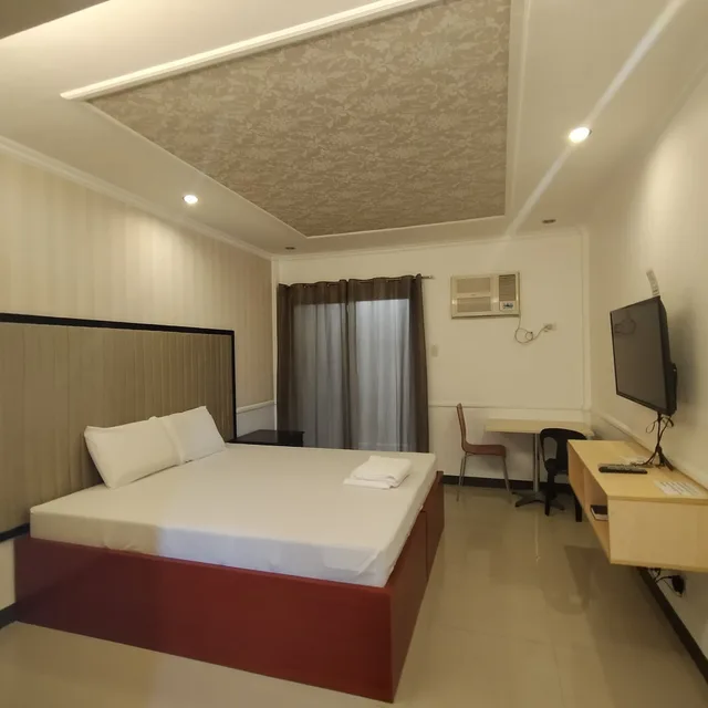 غرفة أساسية بسرير كينج، S&M Hotel 1/7