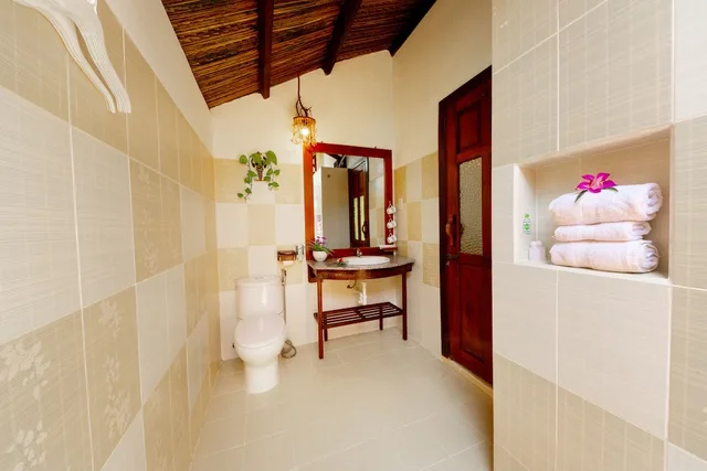 بنغل ثلاثي بسرير مزدوج وسرير فردي بإطلالة على الحديقة، Bao Quynh Bungalow 4/5