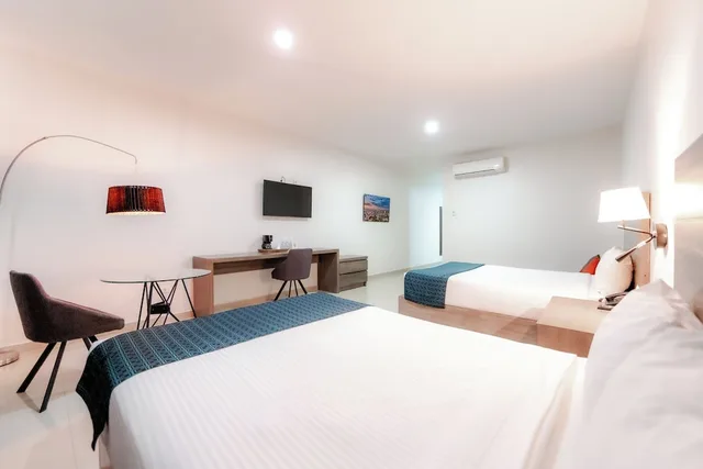 جناح استوديو عائلي بسريرين مزدوجين مع أريكة، InHouse Culiacan (ex. Monterreal Hotel) 3/9