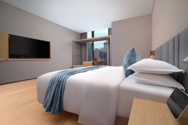 غرفة ديلوكس بسرير كينج بإطلالة على المدينة، Pagoda Hotel Hangzhou Binjiang 3/4