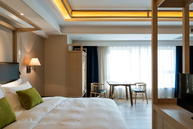 غرفة ديلوكس بسرير كوين، Harbin 22C Boutique Hotel 1/1