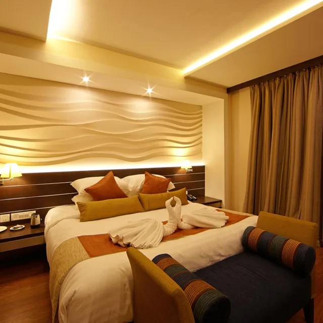 غرفة ديلوكس بسرير كينج، Golden Fruits Business Suites 1/4