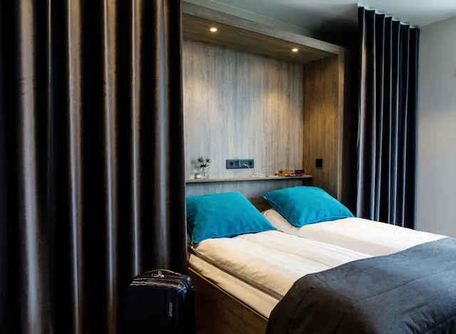 غرفة سوبيريور بسرير كوين وسريرين منفصلين وسرير كوين، Hotell Nissastigen 1/1