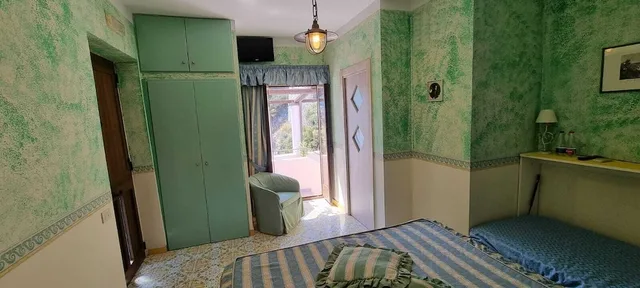 غرفة قياسية ثلاثية بسرير مزدوج وسرير فردي، Locanda Del Fiordo 2/5