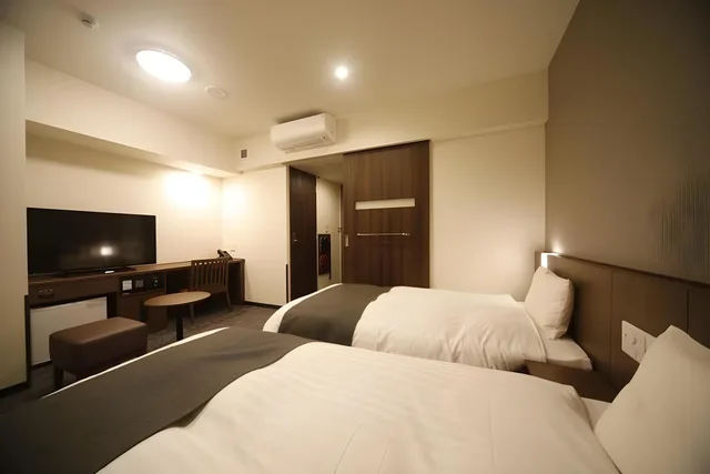 غرفة ديلوكس بسرير فردي، Dormy Inn Oita 1/2
