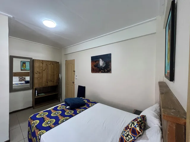 شقة ديلوكس بسريرين كوين مع أريكة بمطبخ صغير، Mustique Suites Curacao 1/3