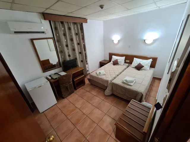 غرفة اقتصادية بسريرين منفصلين، Metropole Hotel 1/2