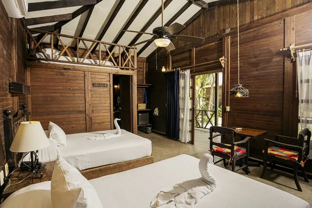 Palm, Beach, Bungalow, 2 Double Beds, 3 Double Beds, Petit Lafitte Hotel 3/9