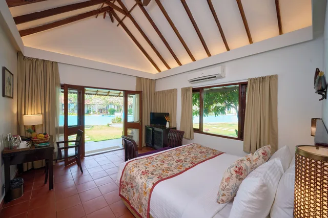 Premium, Cottage, Queen Bed, Pool Side، Aveda Kumarakom 1/3