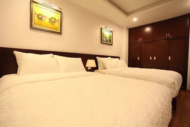 غرفة سوبيريور رباعية بسريرين مزدوجين، Camellia Hotel 1/3