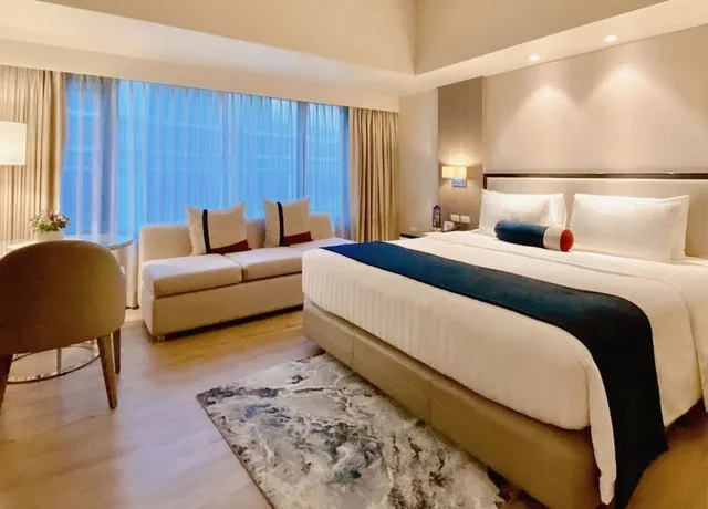 استوديو كبير بسرير كينج بمطبخ صغير مع دخول الصالة، Seda Residences Makati 1/6