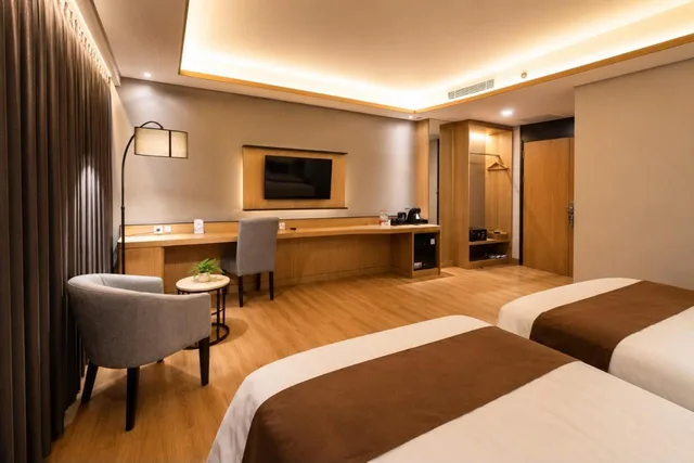 غرفة بريميير ديلوكس بسرير كينج وسرير فردي، Orchardz Hotel Industri 3/5