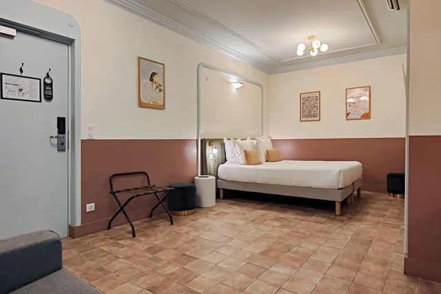 استوديو تنفيذي بسريرين منفصلين بشرفة مع أريكة، Hôtel Au Picardy 2/6