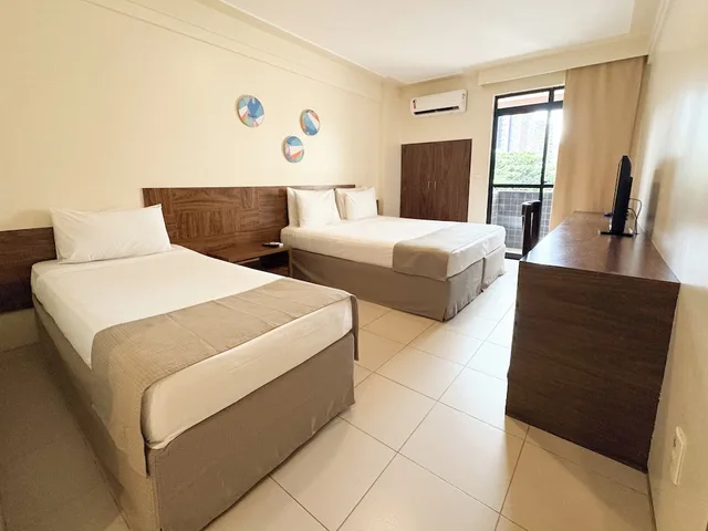 غرفة قياسية رباعية بسرير كوين وسريرين منفصلين، D8 Hotel Express 3/10