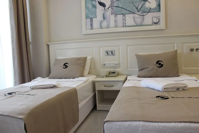 غرفة ثلاثية بسريرين منفصلين بإطلالة جزئية على البحر، Savk Hotel Alanya 7/10
